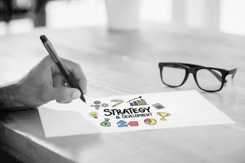 Composite image of side view of hand writing on white page on working desk Stock Illustration