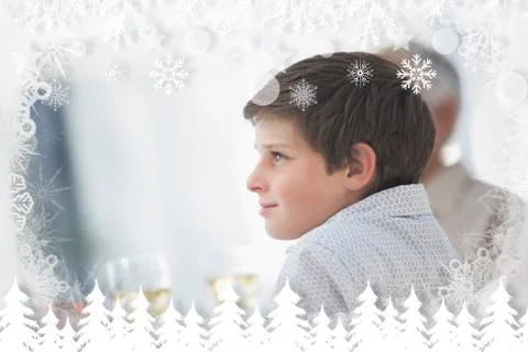 Composite image of side view of a little boy at table イラスト素材