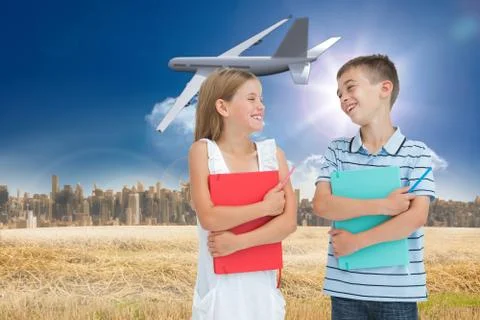 Composite image of smiling brother and sister holding their exercise books 스톡 일러스트