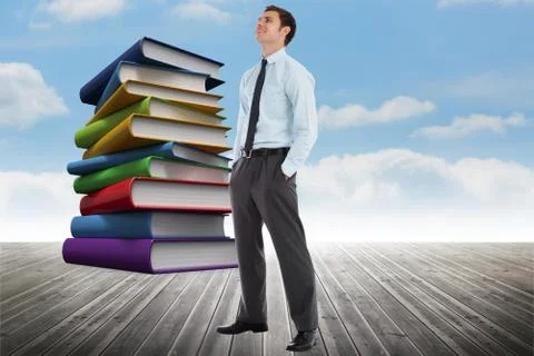 Composite image of smiling businessman standing with hands in pockets Illustrazione stock