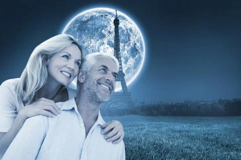 Composite image of smiling couple embracing and looking Stock Illustration