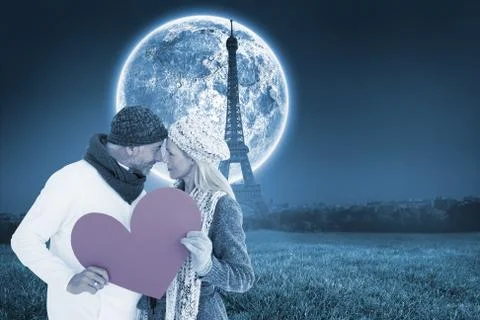 Composite image of smiling couple in winter fashion posing with heart shape Stock Illustration