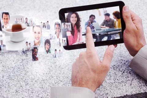 Composite image of smiling designer using tablet Stockillustratie