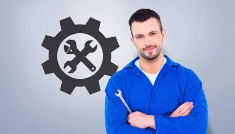 Composite image of smiling male mechanic holding spanner Stock Illustration