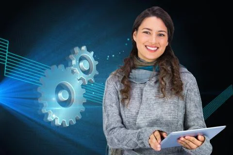Composite image of smiling model wearing winter clothes holding her tablet Stock Illustration