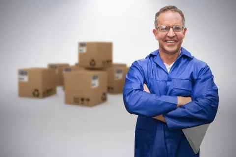 Composite image of smiling warehouse manager standing with arms crossed Stock Photos