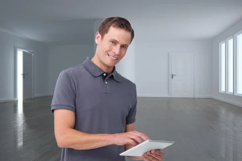 Composite image of smiling young man with tablet computer Stock Illustration