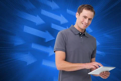 Composite image of smiling young man with tablet computer Stockillustratie