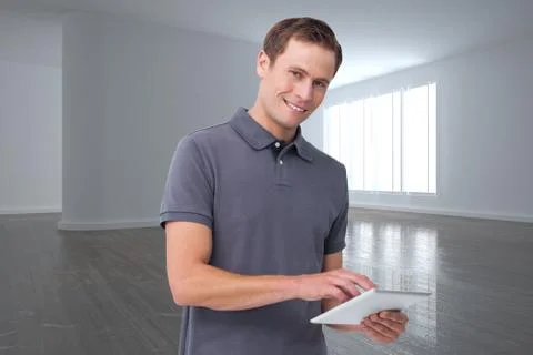 Composite image of smiling young man with tablet computer Stock Illustration