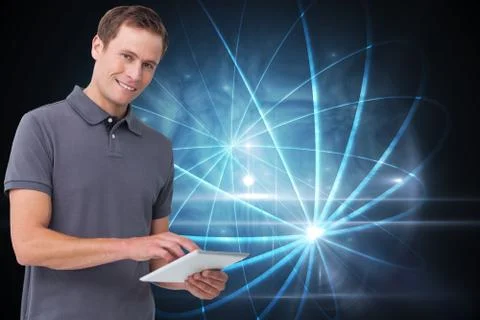 Composite image of smiling young man with tablet computer Illustrazione stock