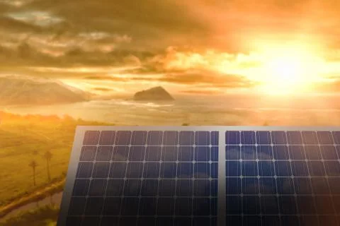 Composite image of solar panel equipment against sunset over sea Stock Photos