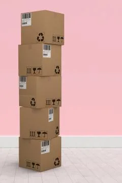 Composite image of stack of cardboard boxes on white background 스톡 사진