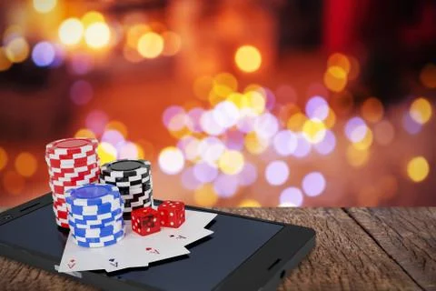 Composite image of stack of casino tokens with playing cards and dice on Stock Illustration