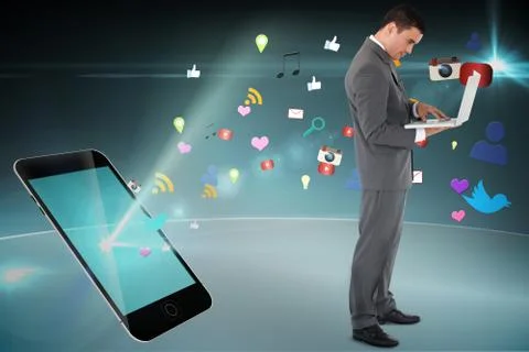 Composite image of standing businessman typing on his laptop Illustrazione stock