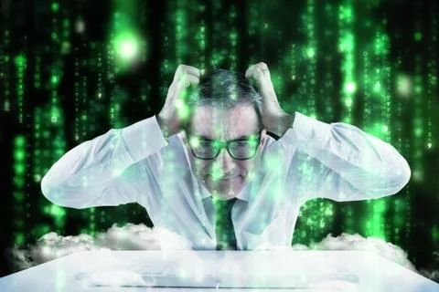 Composite image of stressed businessman using a keyboard Illustrazione stock