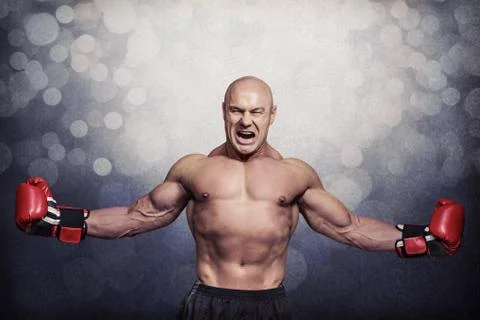 Composite image of successful boxer with arms outstretched Stock Photos