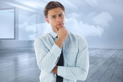 Composite image of thinking businessman with hand on chin Stock Illustration
