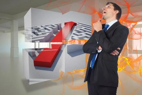 Composite image of thinking businessman holding pen Stockillustratie