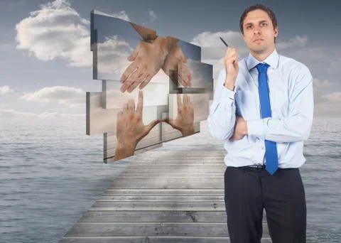 Composite image of thinking businessman holding pen Illustrazione stock