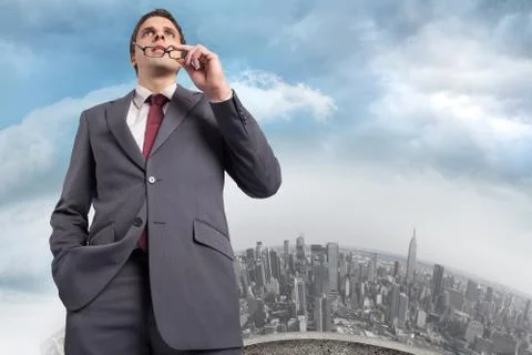 Composite image of thinking businessman holding his glasses 스톡 일러스트