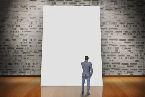 Composite image of thinking businessman Illustrazione stock
