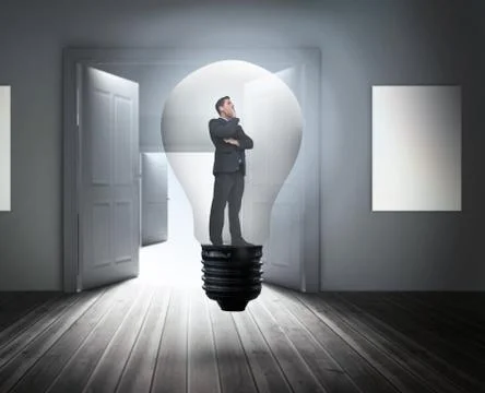 Composite image of thinking businessman in light bulb 스톡 일러스트