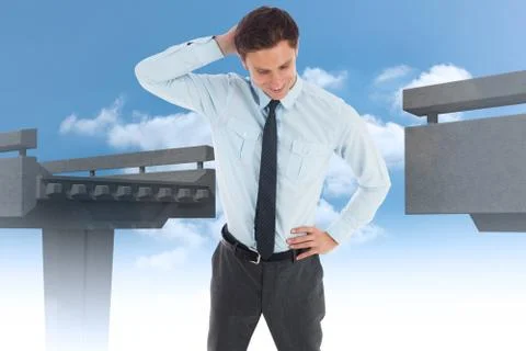 Composite image of thinking businessman scratching head Illustrazione stock