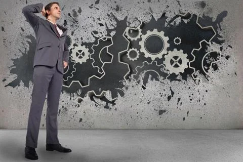 Composite image of thinking businessman scratching head Illustrazione stock