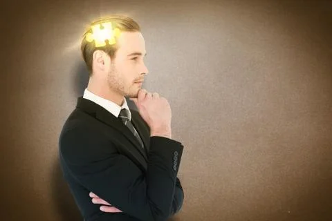 Composite image of thinking businessman standing with hand on chin Stockillustratie