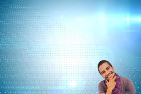 Composite image of thinking man sitting on floor using laptop and smiling Illustrazione stock