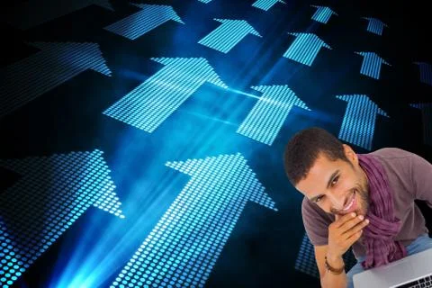 Composite image of thoughtful man sitting on floor using laptop and smiling at Illustrazione stock