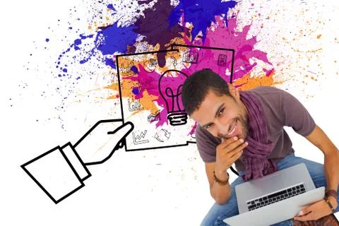 Composite image of thoughtful man sitting on floor using laptop and smiling at Stock Illustration