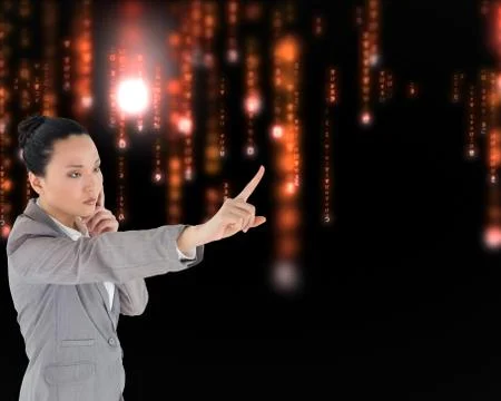 Composite image of unsmiling thinking asian businesswoman pointing Stock Illustration