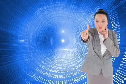 Composite image of unsmiling thinking asian businesswoman pointing 스톡 일러스트