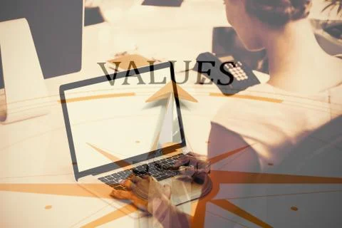Composite image of values against compass Foto stock