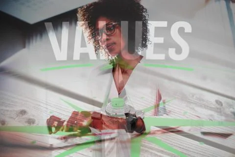 Composite image of values against digitally generated grey wooden planks Foto stock