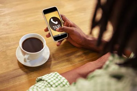 Composite image of vector image of taxi text with phone Foto stock