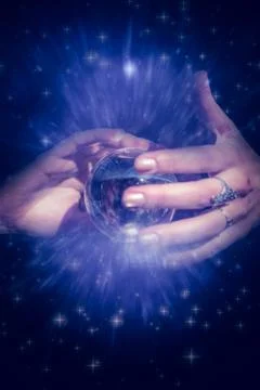 Composite image of woman using crystal ball Illustrazione stock