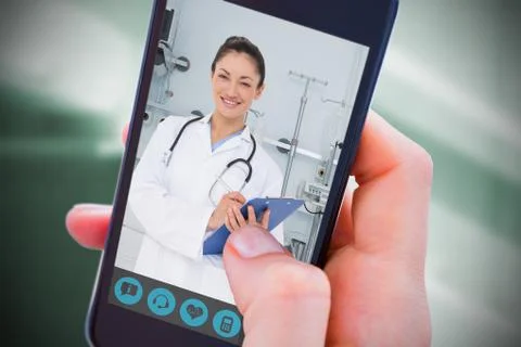 Composite image of woman using her mobile phone Stock Photos