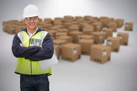 Composite image of worker wearing hard hat in warehouse Fotos de archivo