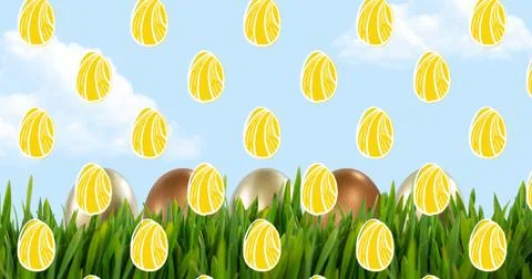 Composite image of yellow easter eggs in seamless pattern against green grass 스톡 사진