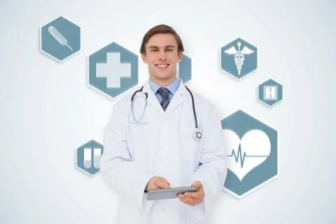 Composite image of young doctor using tablet pc Stock Illustration