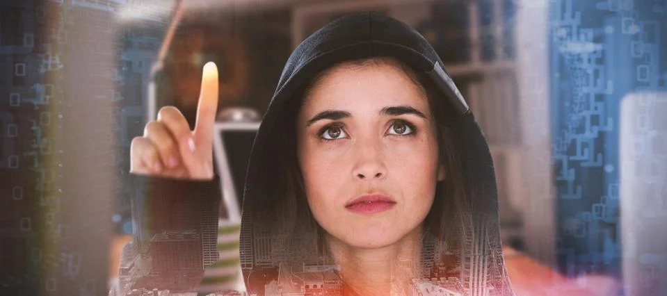 Composite image of young female hacker using digital screen 写真素材