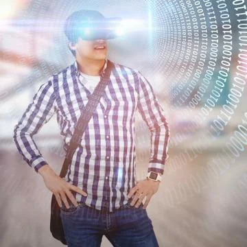 Composite image of young man with hand on hop wearing virtual reality simulator Stockfoto's