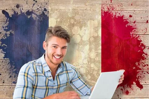 Composite image of young student using laptop Illustrazione stock