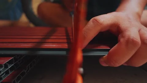 Composite Panel Installation: Hand Marking Line on Wood-Look Decking Surface Stock Footage 333321913