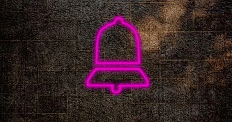 Composite of pink digital notification bell icon glowing against old wall, copy Stock Photos