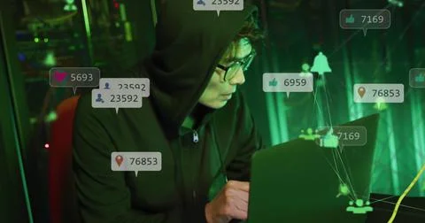 Composite of social media data processing over asian male hacker using computer Stock Photos