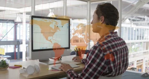 Composite of world map and data processing over businessman using computer in Stock Footage 328714855