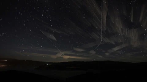 Composited star trails and high clouds Time lapse over castaic lake Stock Footage 35847674